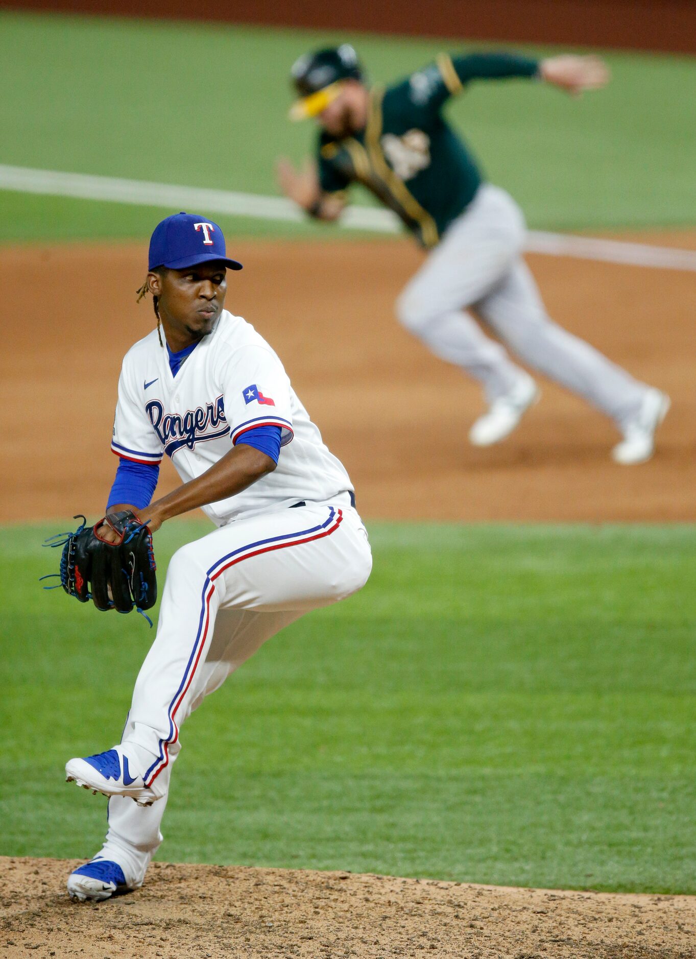 Texas Rangers relief pitcher Rafael Montero (48) pitches during the eighth inning as Oakland...