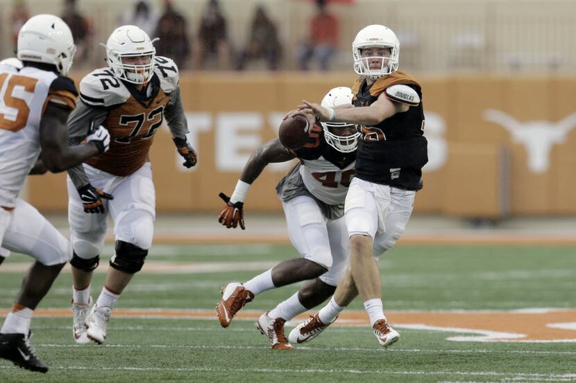 Texas quarterback Shane Buechele (16) looks to throw during a spring NCAA college football...