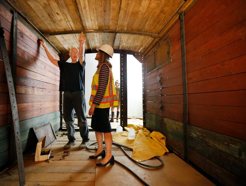 Historic preservationist Ron Siebler shows Mary Pat Higgins, president and CEO of the Dallas...