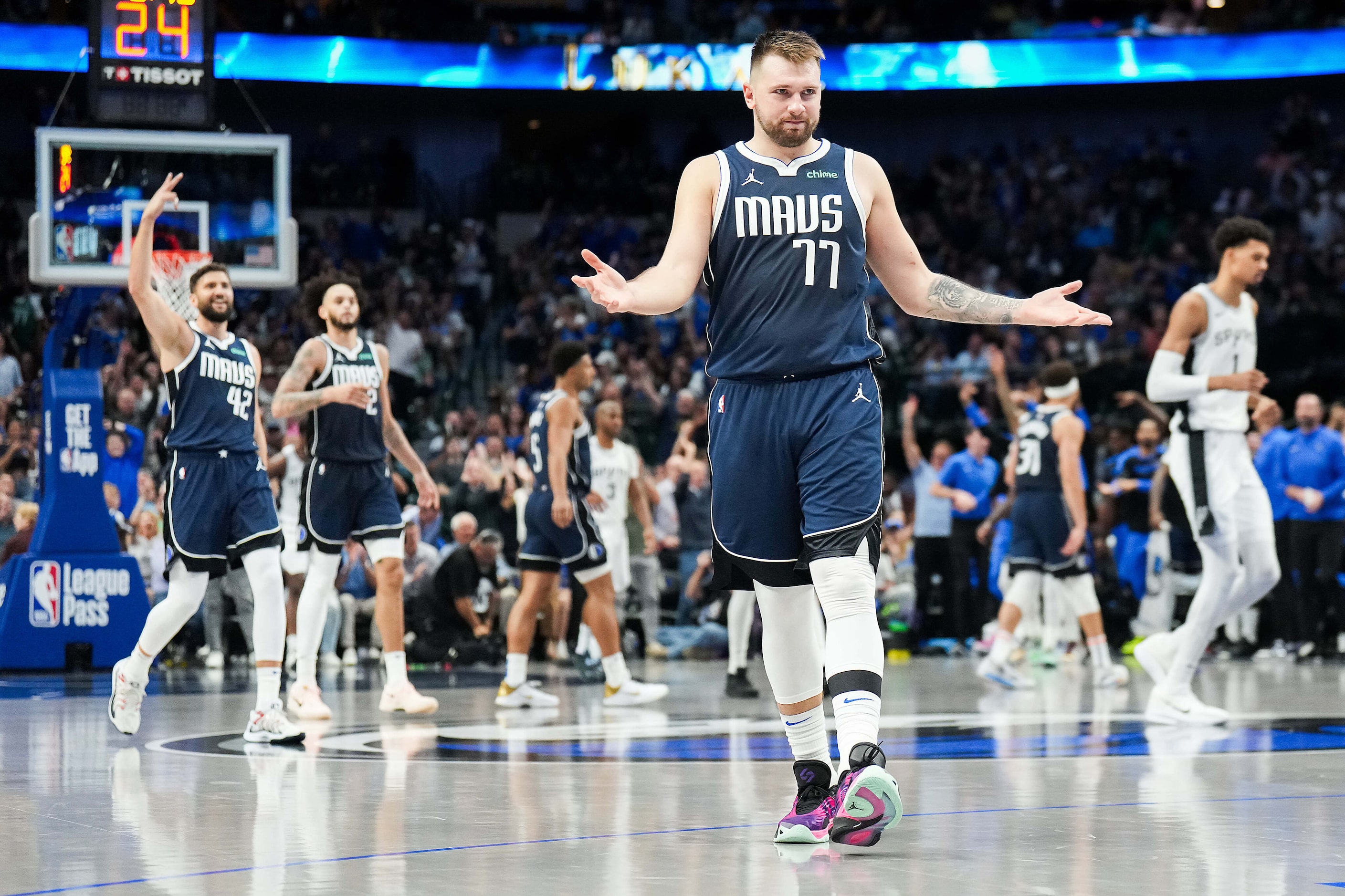 Dallas Mavericks guard Luka Doncic (77) celebrates after hitting a 3-pointer during the...