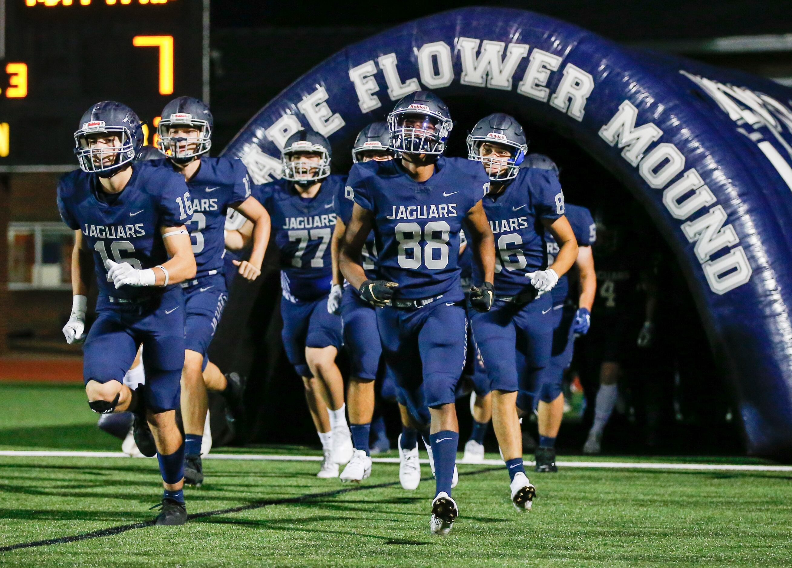 Flower Mound takes the field for the second half a high school football game against...