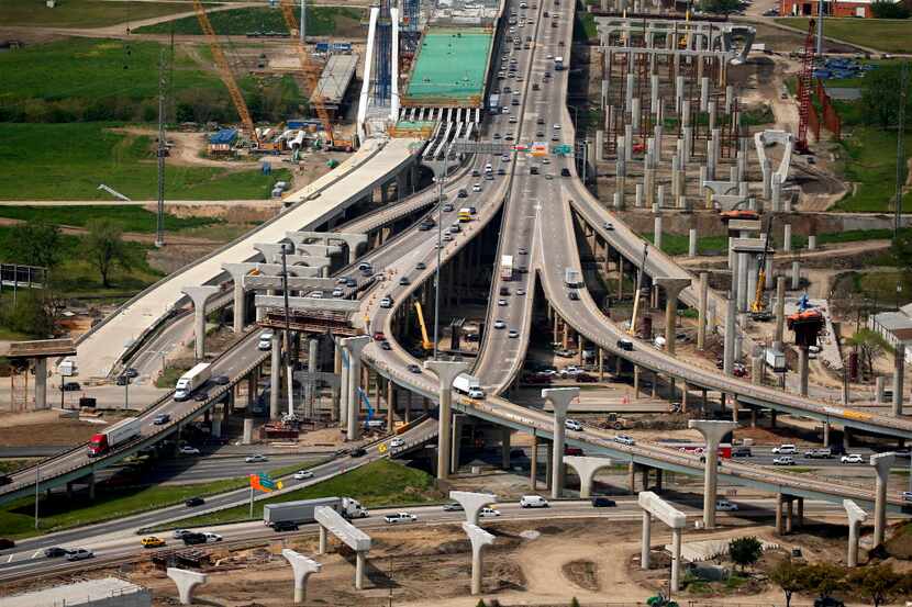  A car travels along the northbound I-35 portion of the Horseshoe Project Wednesday, January...