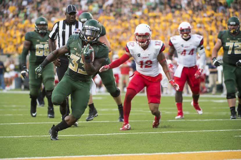 WACO, TX - SEPTEMBER 2:  Jamychal Hasty #33 of the Baylor Bears breaks free for a 13 yard...