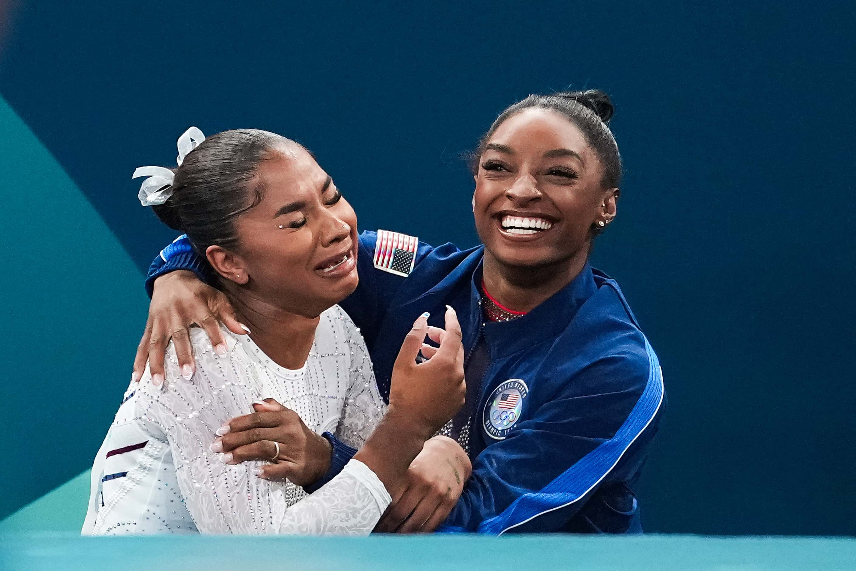 Bronze medalist Jordan Chiles (left) and silver medalist Simone Biles of the United States...