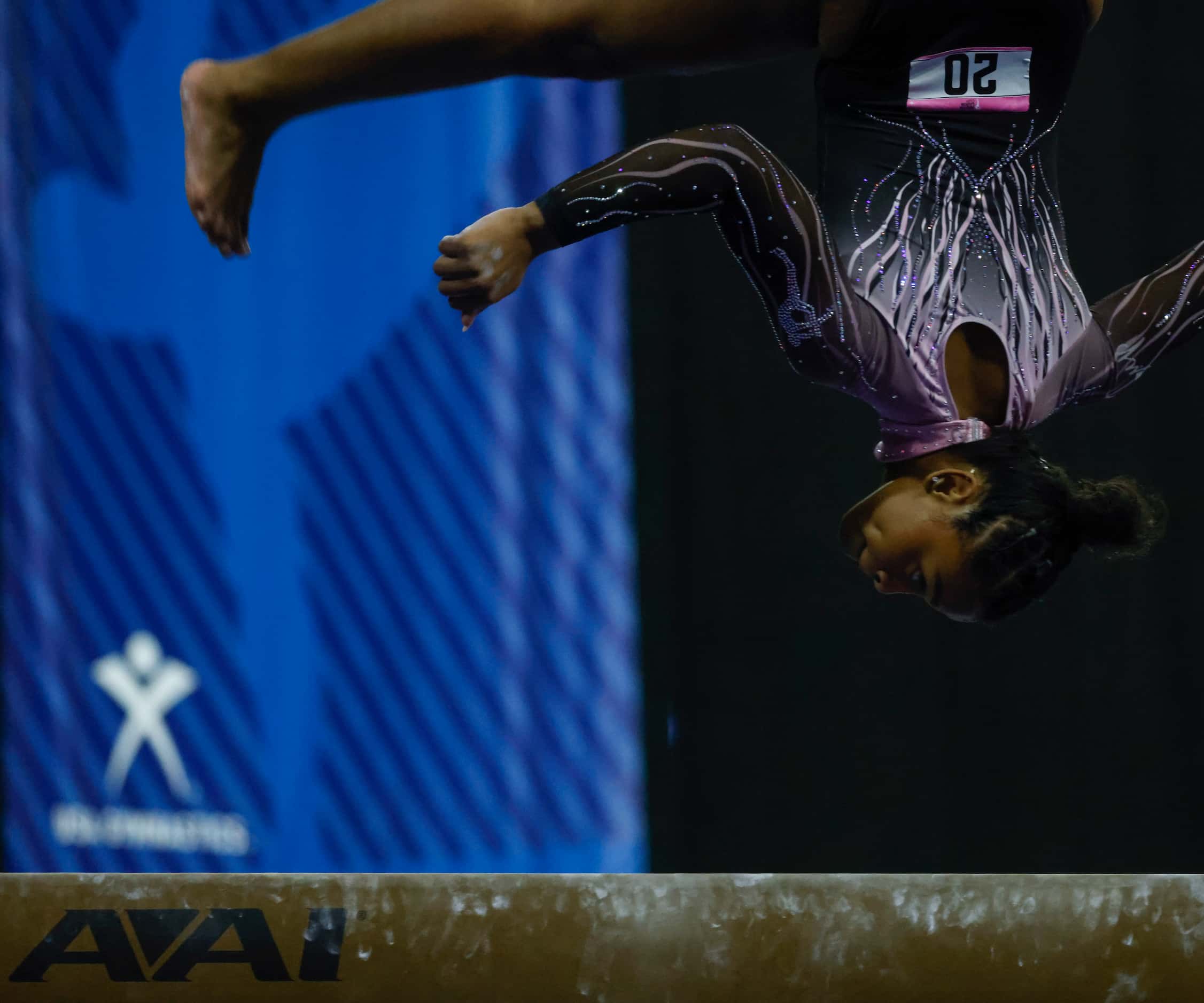 Selena Harris of Gymcats, Henderson, Nevada competes in balance beam during Nastia Liukin...