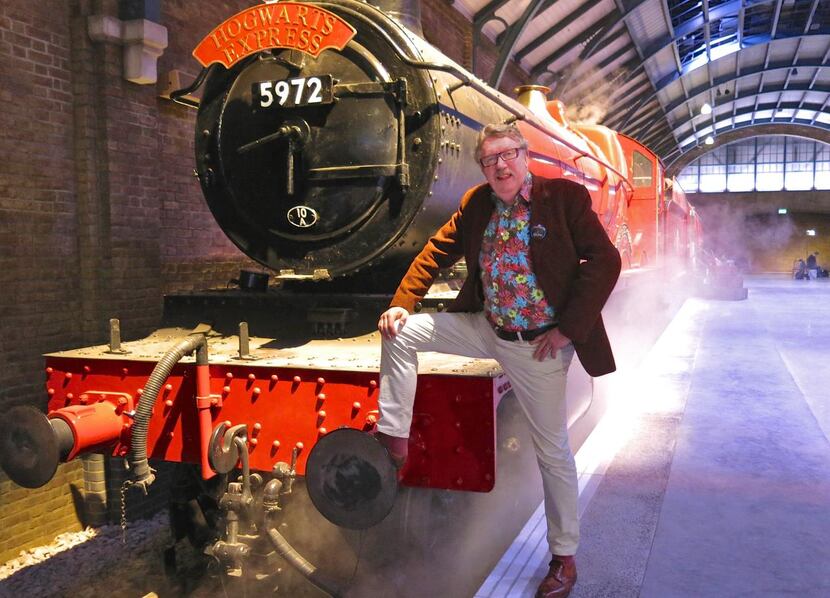 Mark Williams, who played Mr. Weasley in the Harry Potter films, poses with the Hogwarts...