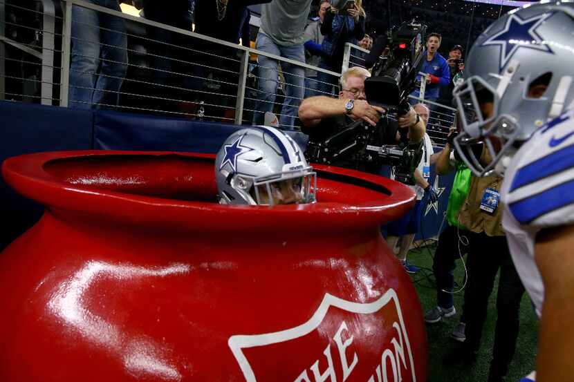 ARLINGTON, TX - DECEMBER 18:  Ezekiel Elliott #21 of the Dallas Cowboys celebrates after...