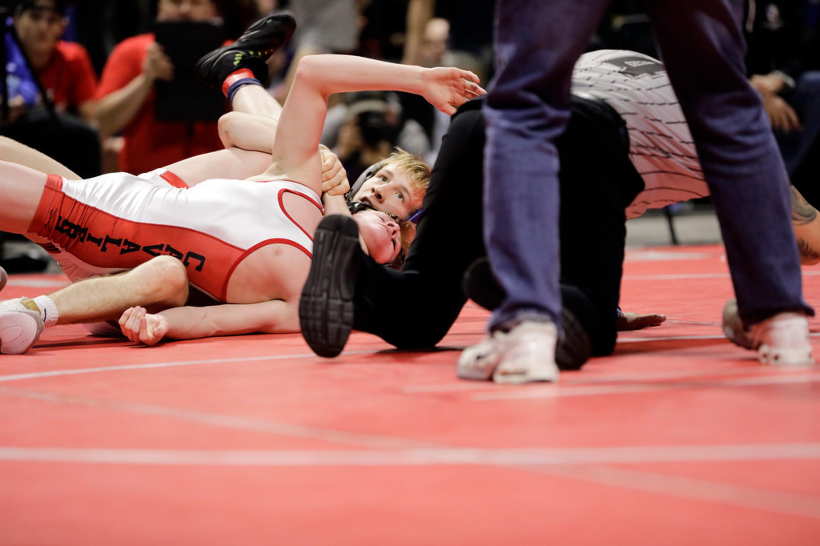 Braxton Brown of Allen wrestles during the UIL Texas State Wrestling Championships,...