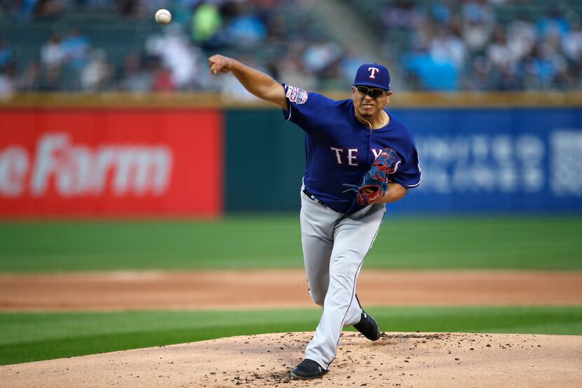 Texas Rangers starting pitcher Ariel Jurado delivers during the first inning of the team's...