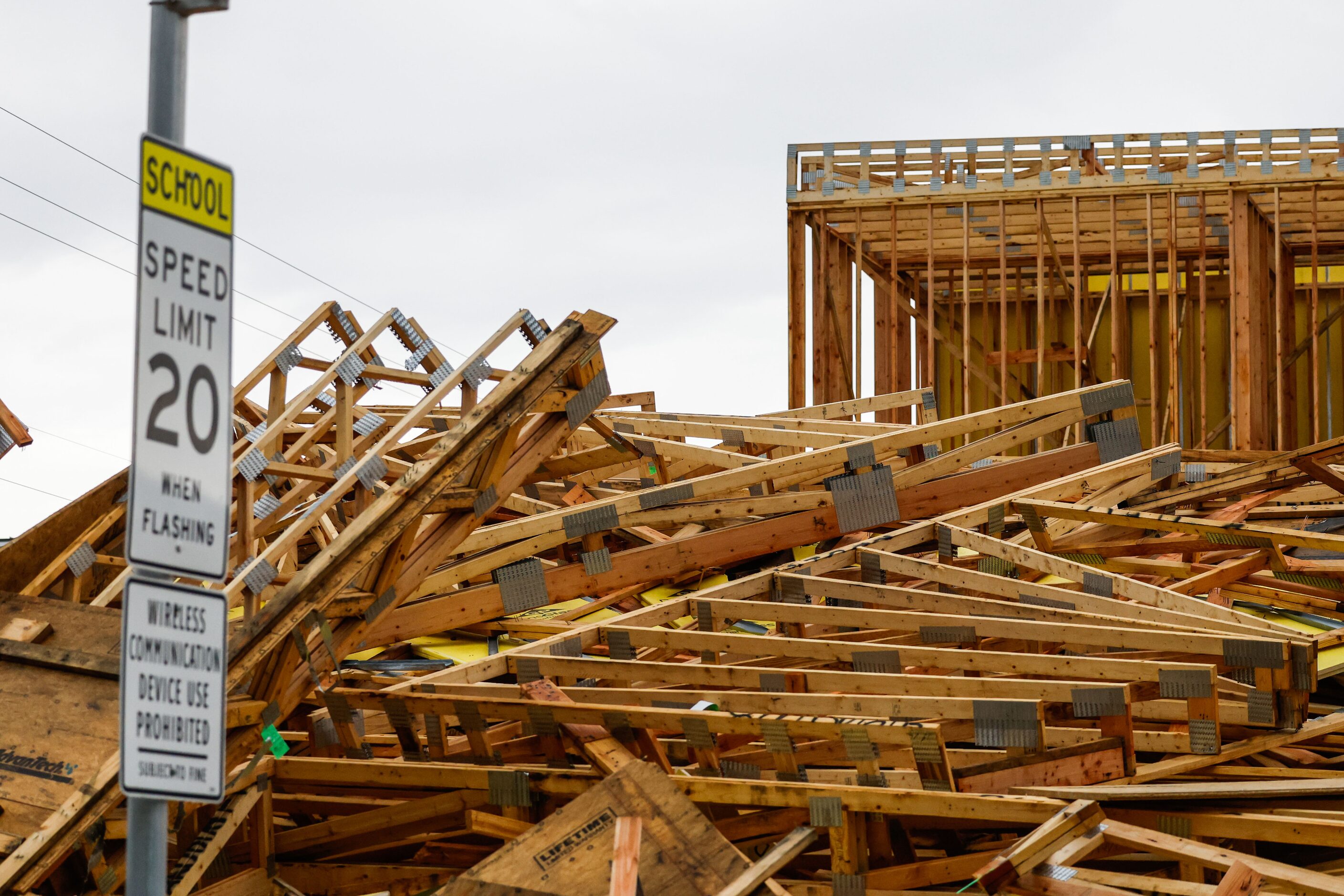 A townhouse construction partially collapsed at Munger Ave and Annex Ave after a severe...