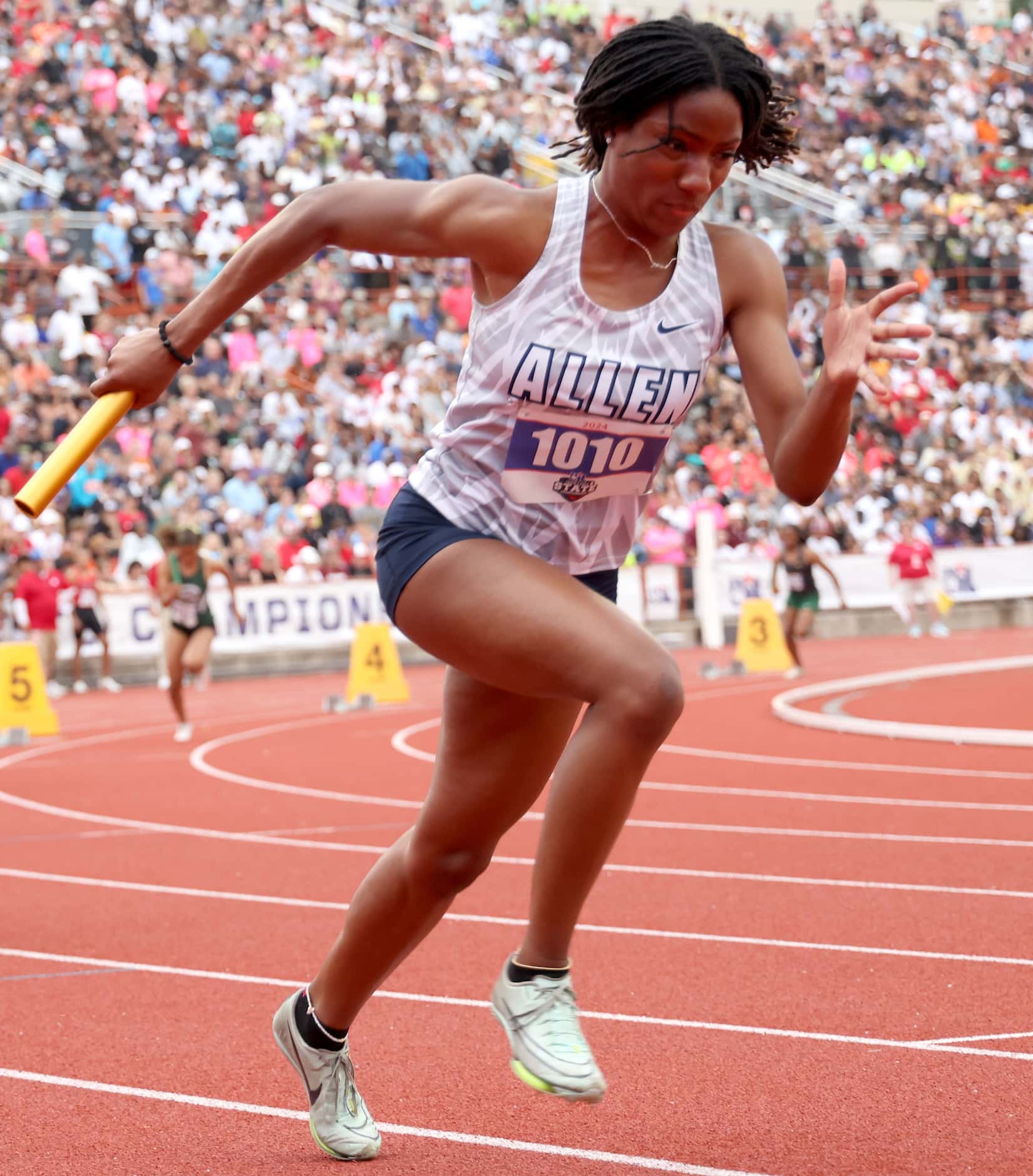 Allen's Laila Greer runs the first leg of the 6A 4X100 relay. The team finished 5th in the...