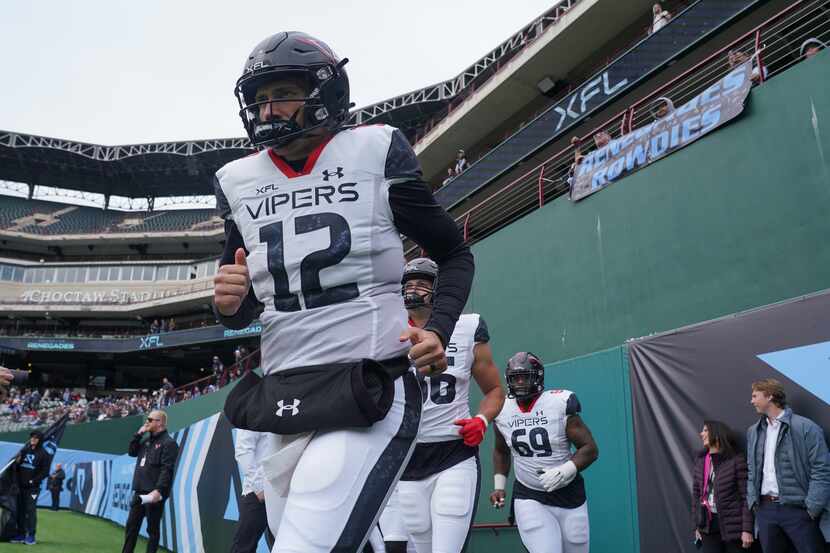 Vegas Vipers quarterback Luis Perez (12) runs onto the field before an XFL football game...