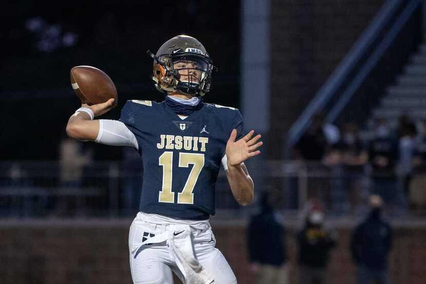 Jesuit junior quarterback Gage Roy (17) winds up to throw in the first half of a high school...