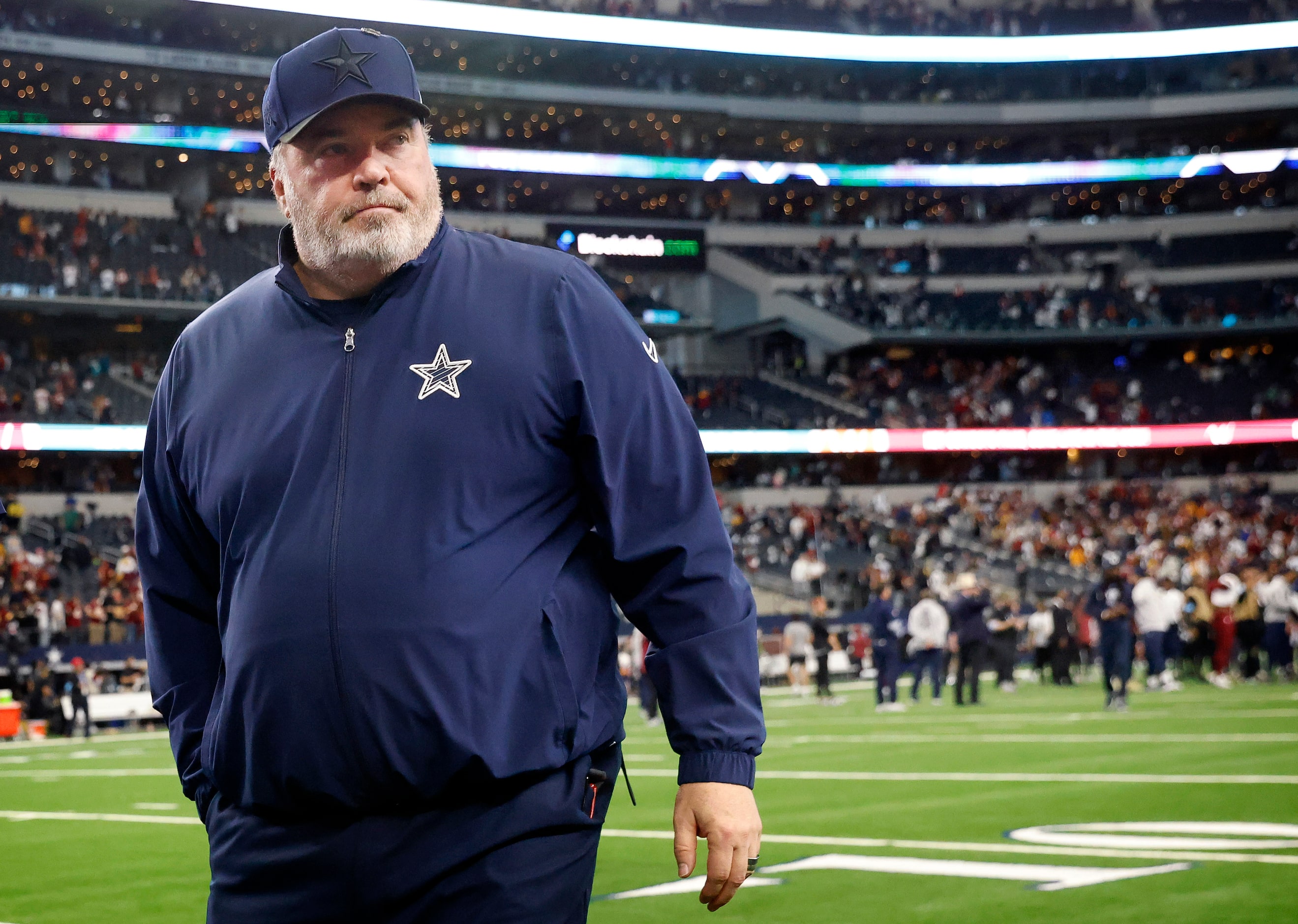 Dallas Cowboys head coach Mike McCarthy walks to the locker room following their season...