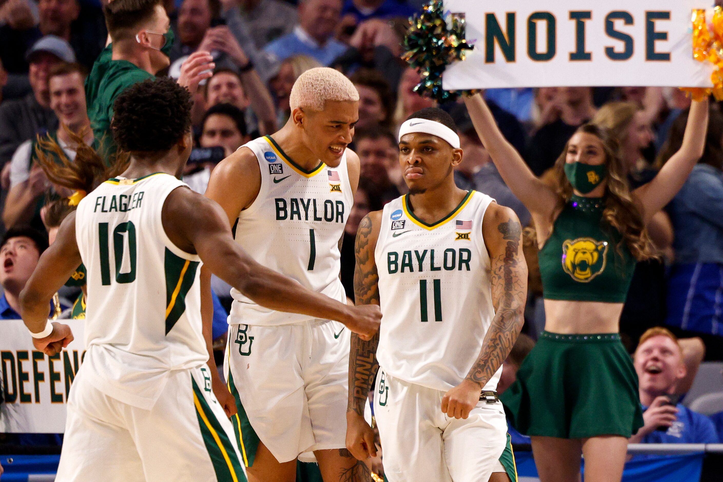 Baylor Bears guard Adam Flagler (10), Baylor Bears forward Jeremy Sochan (1) celebrate a...