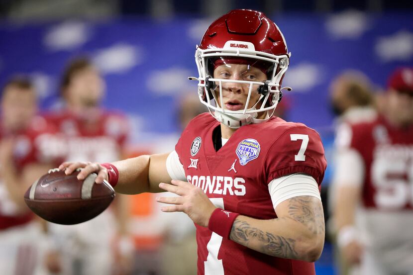Oklahoma quarterback Spencer Rattler (7) warms up before the Cotton Bowl Classic against...