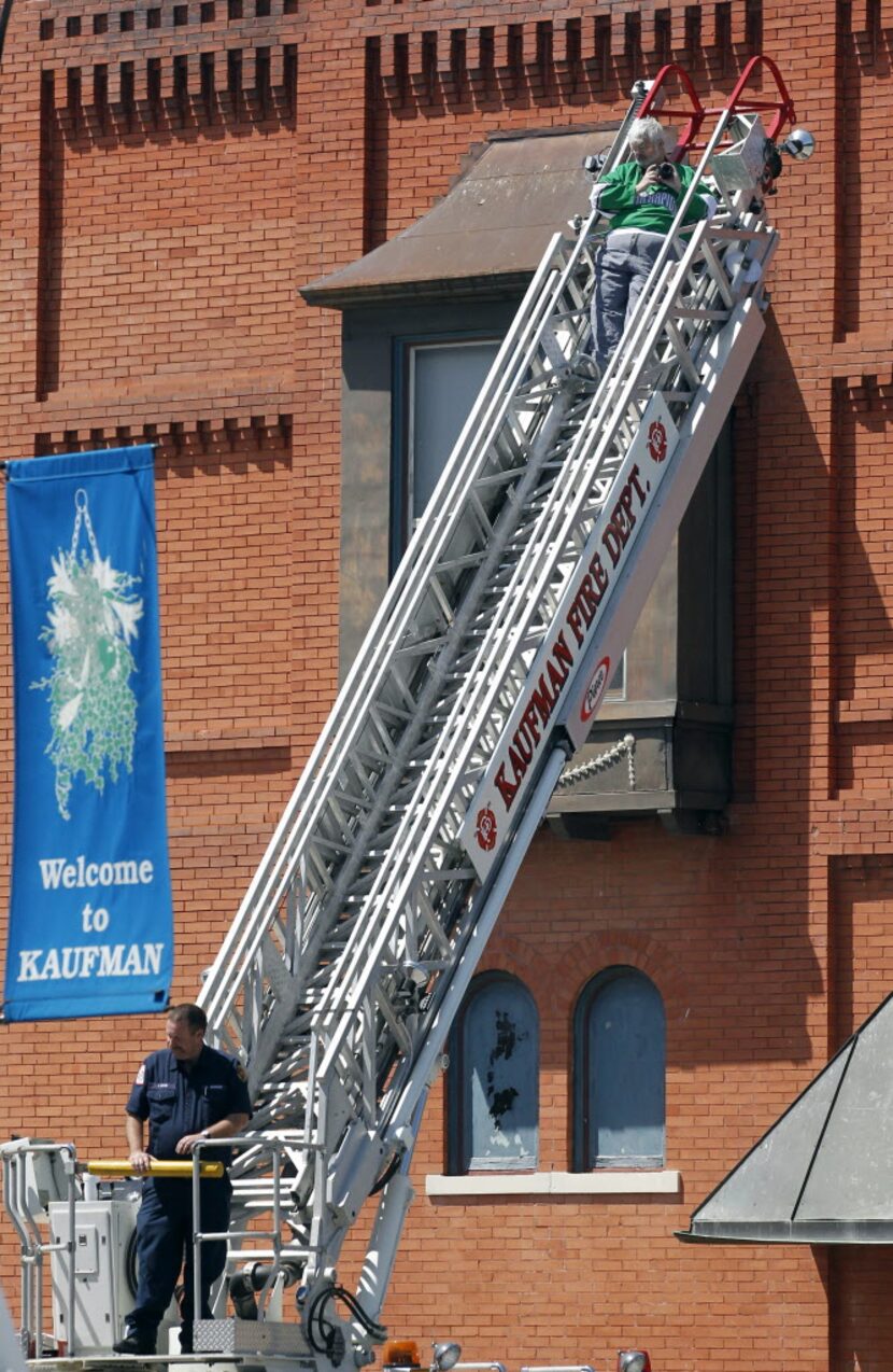 Loyd Cook, a reproter with The Kaufman Herald, gets some assistance from the Kaufman Fire...