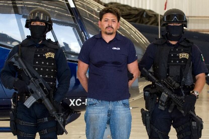 Arnoldo Rueda-Medina, aka "La Minsa," a member of the La Familia drug cartel, was presented...
