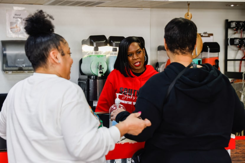 Nicole Sternes talks with customers at SouthSide Steaks & Cakes.