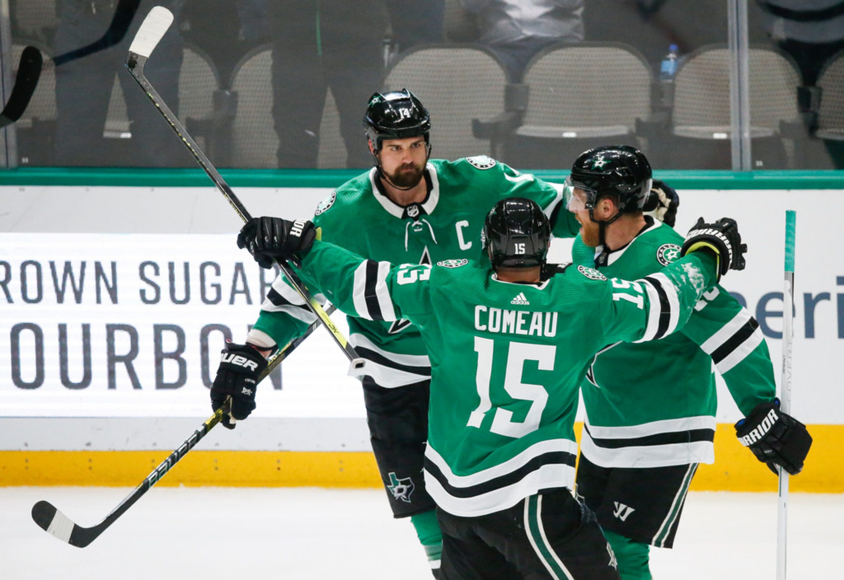 Dallas Stars left wing Jamie Benn (14) celebrates scoring on Tampa Bay Lightning goaltender...