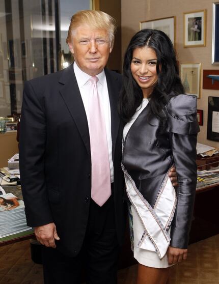 Donald Trump, in 2010 with newly crowned Miss USA Rima Fakih at his office in New York,...