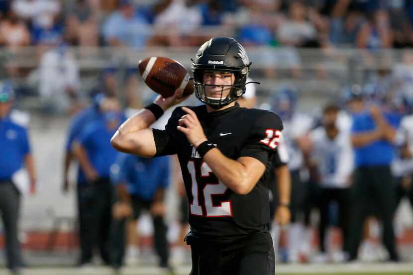 Argyle quarterback CJ Rogers (12) throws during a high school football game against Decatur...