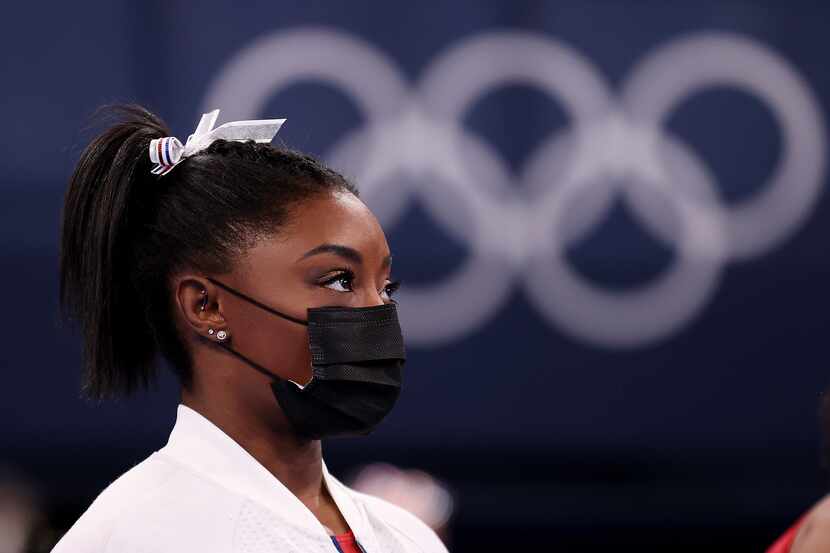 Team USA gymnast Simone Biles looks on during the women's team final at the Tokyo Olympics...