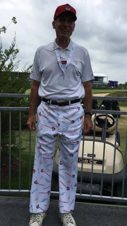 Mike Massad Jr. stands at the Nelson wearing the pants his dad wore to Nelson tournaments in...