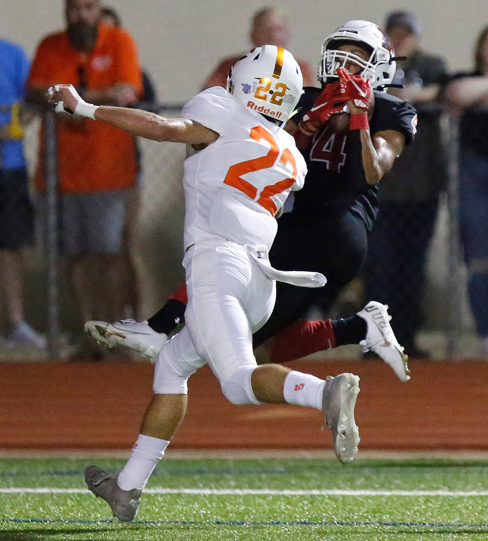 Melissa High School wide receiver Jayvon Smith (4) catches a touchdown behind Celina High...