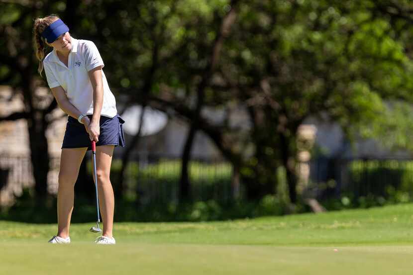 Highland Park's Sophie Biediger putts on the 10th green during round 1 of the UIL Class 5A...