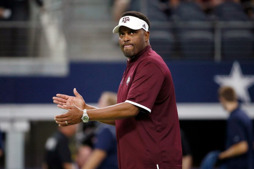 FILE - In this Sept. 26, 2015 file photo, Texas A&M coach Kevin Sumlin applauds his team as...