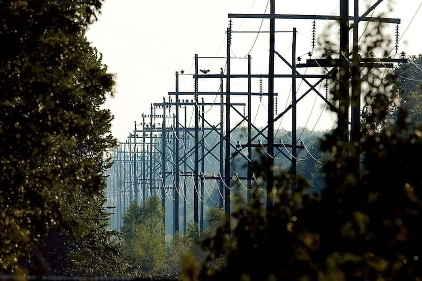 Oncor transmission lines looking southwest from Rock Hill Road Friday September 17, 2010,...