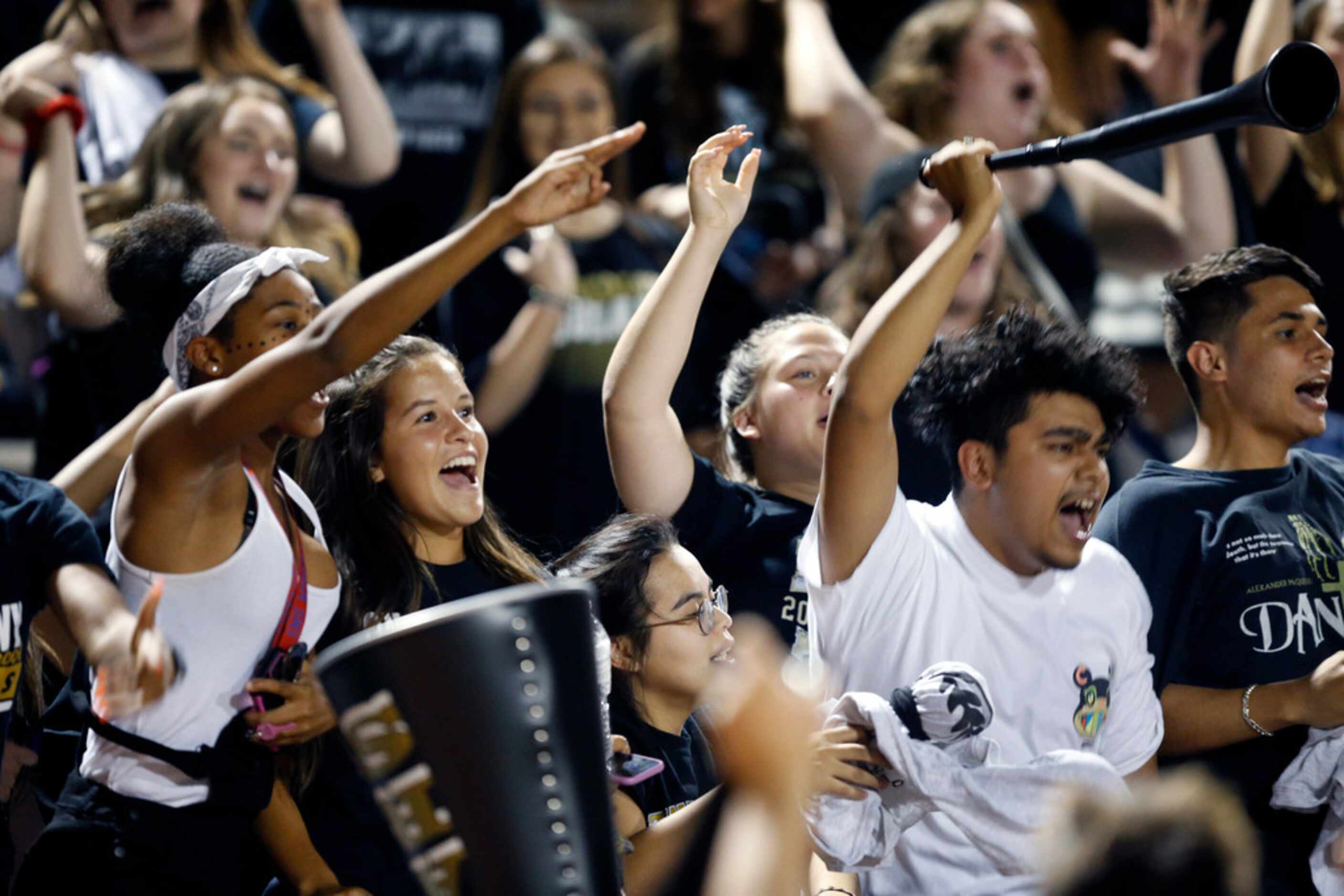 The Colony students cheer their team during the fourth quarter against Frisco Reedy at Tommy...