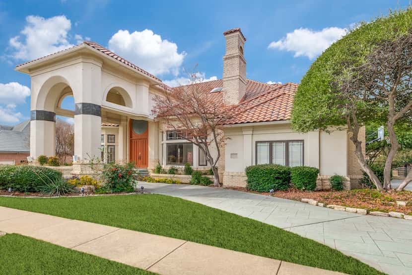 The home at 4611 Pine Valley Drive in Frisco, set on Stonebriar's 16th fairway, will be open...