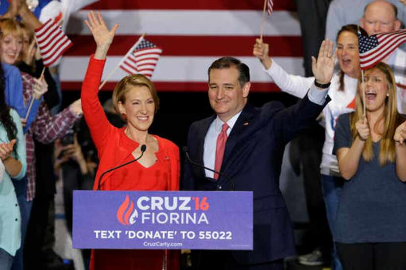  Sen. Ted Cruz and former Hewlett-Packard CEO Carly Fiorina wave during a rally in...