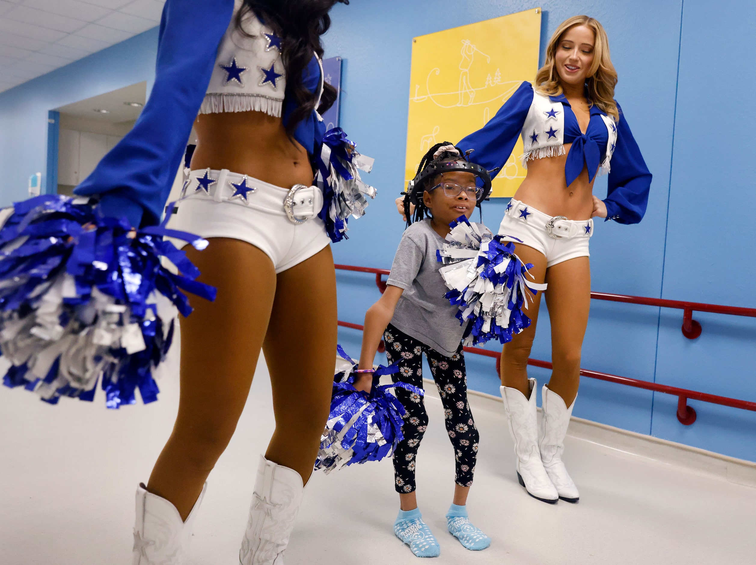 Serenitee Jackson was all smiles after she learned a cheer from Dallas Cowboys Cheerleaders...