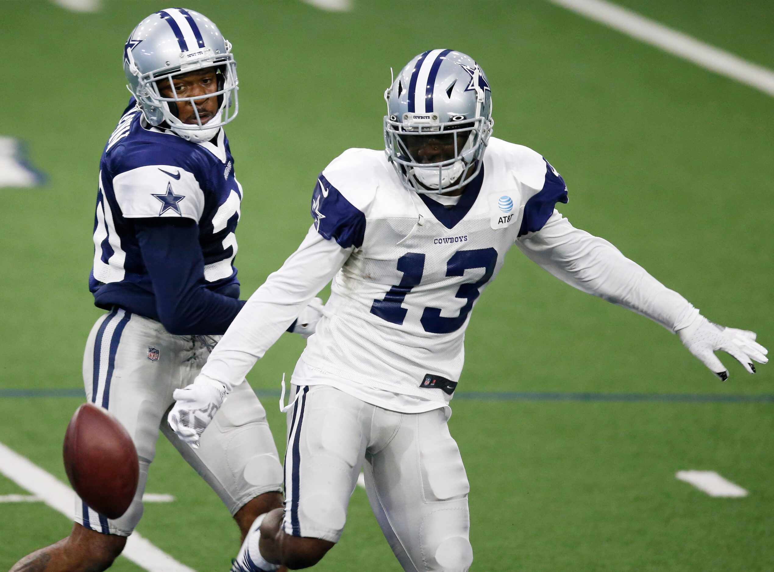 Dallas Cowboys cornerback Anthony Brown (30) punches the ball out of the hands of Dallas...