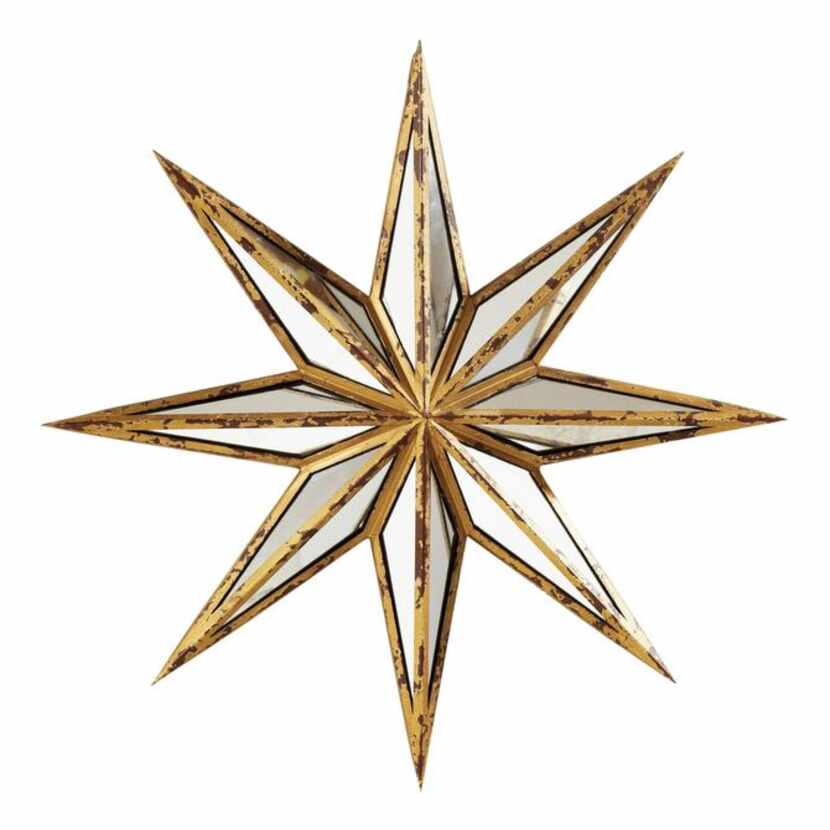 
Star of wonder: Reflecting the joy of holiday festivities, this star mirror has 16 glass...