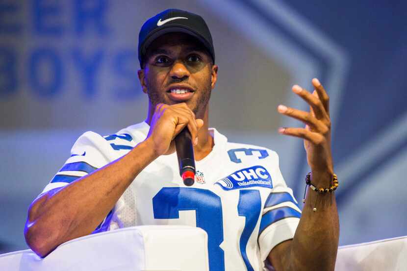 Former Dallas Cowboys first round draft pick, Byron Jones is interviewed by sportscaster...