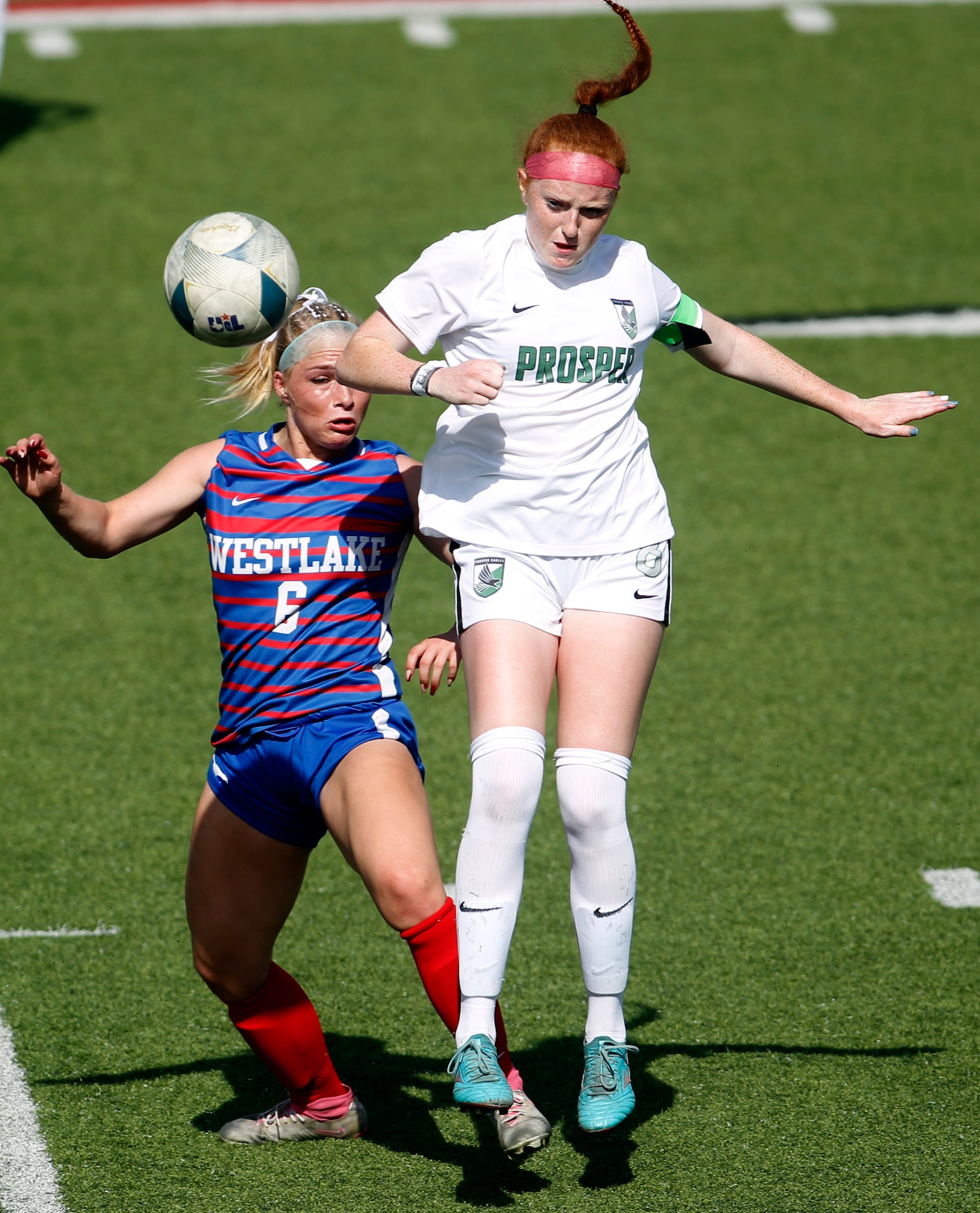  Prosper midfielder Olivia Hess (8), right, advances the ball beyond Austin Westlake...