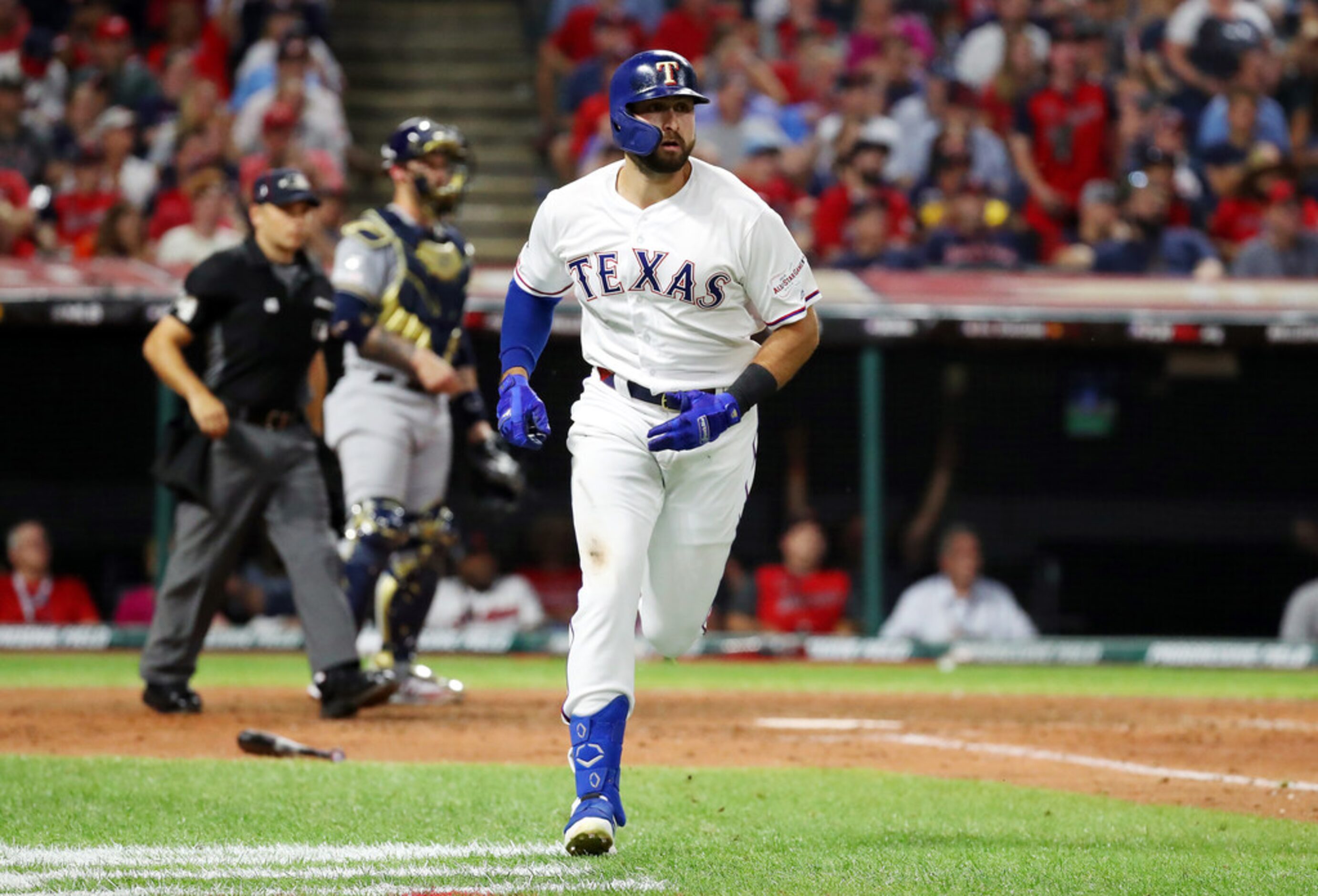 CLEVELAND, OHIO - JULY 09: Joey Gallo #13 of the Texas Rangers and the American League runs...