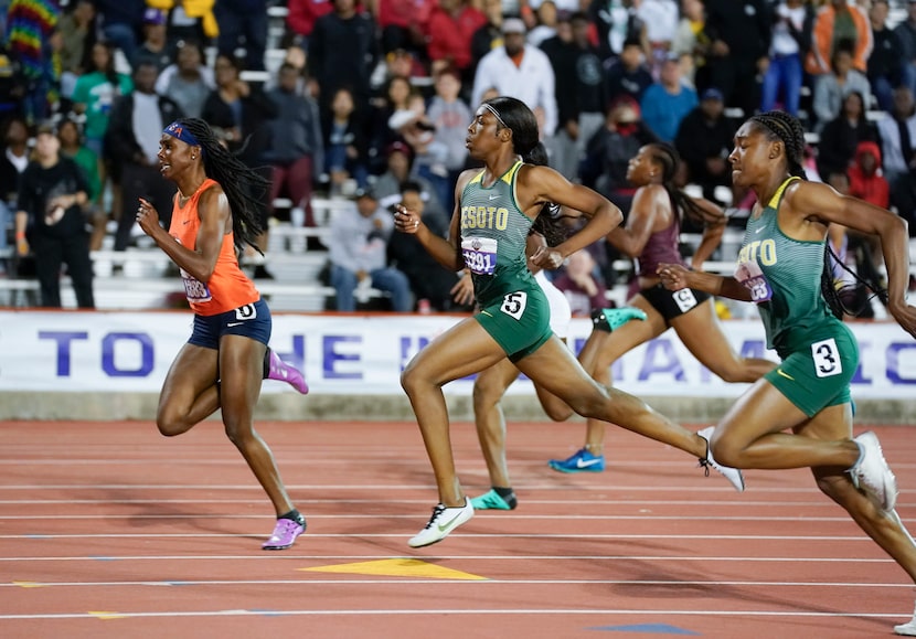 DeSoto's Jayla Hollis (1293) and Rosalie Effiong (1291) head to the finish behind winner ...