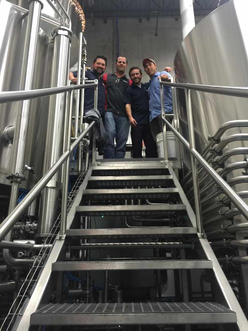 Gary Humble (left) of Grapevine Craft Brewery and Josh Horowitz (second from left) of...