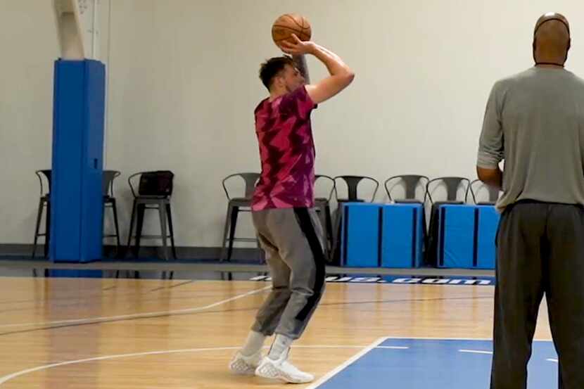 Dallas Mavericks guard Luka Doncic practices free throws from the first mandatory workout on...