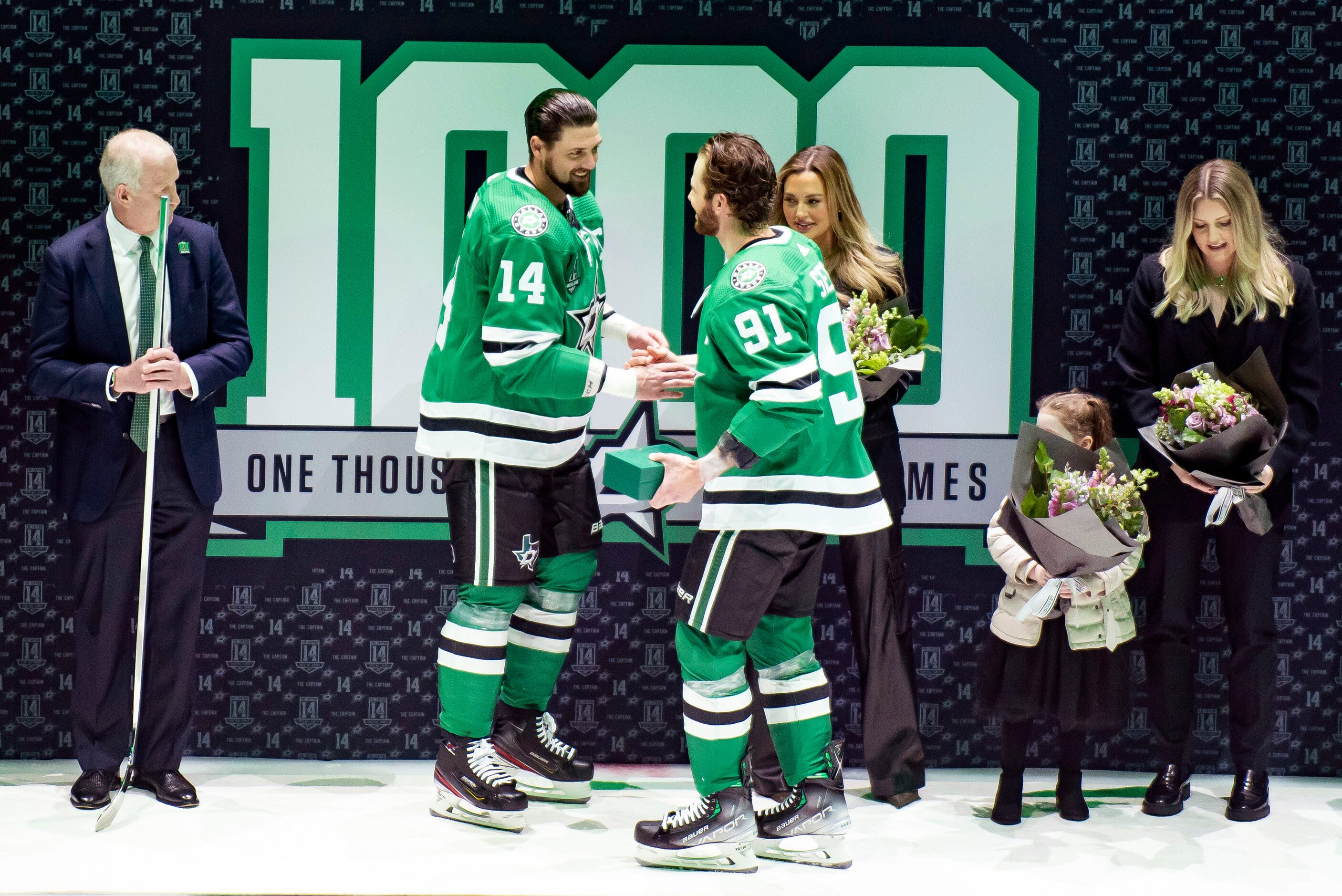 Dallas Stars left wing Jamie Benn (14) and center Tyler Seguin (91) shake hands during a...