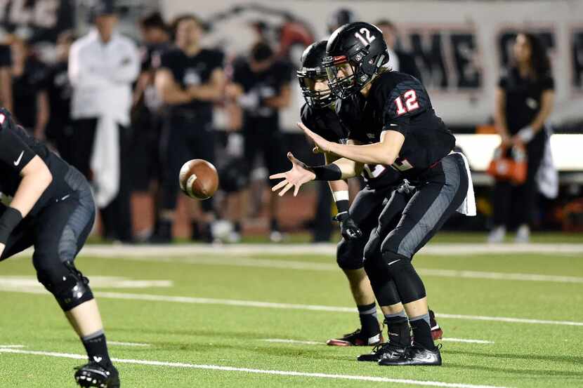 Hayden Clearman (12), pictured last season, is battling to be Argyle's starting quarterback....