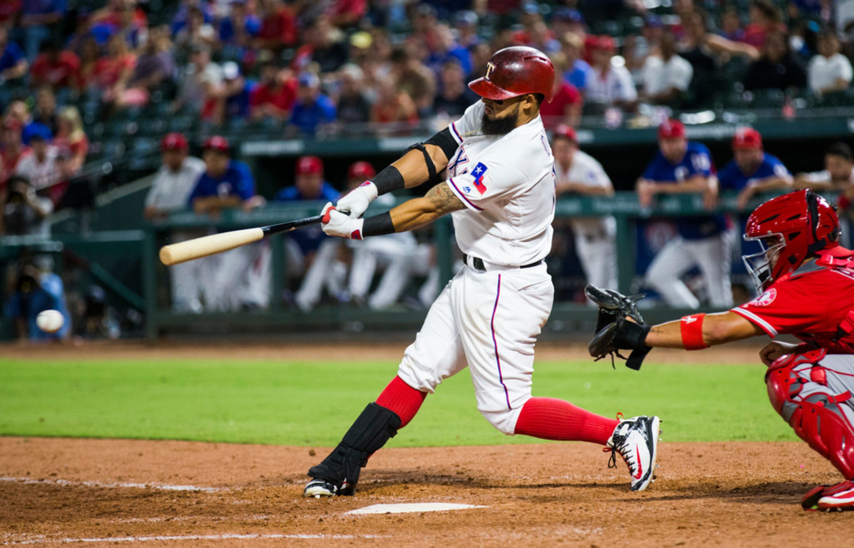 Texas Rangers second baseman Rougned Odor (12) bats during the eighth inning of an MLB game...