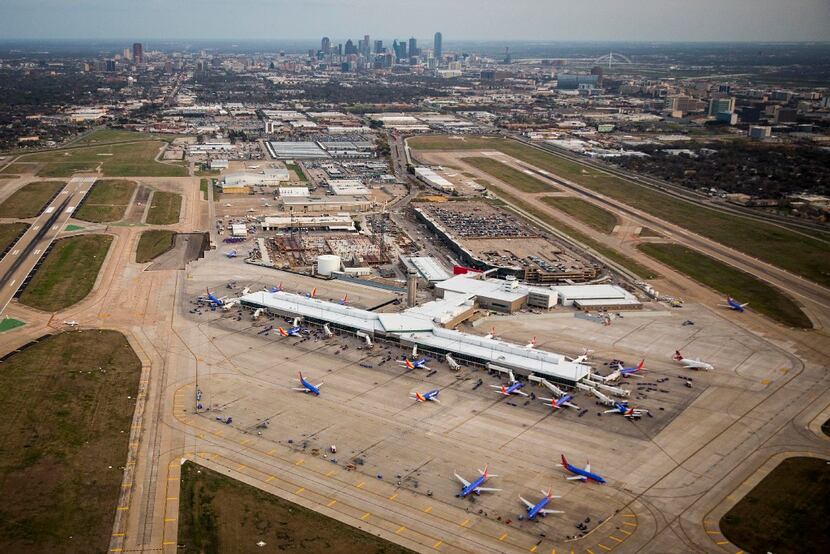 Dallas Love Field and the downtown skyline seen in a aerial view on Monday, March 6, 2017,...