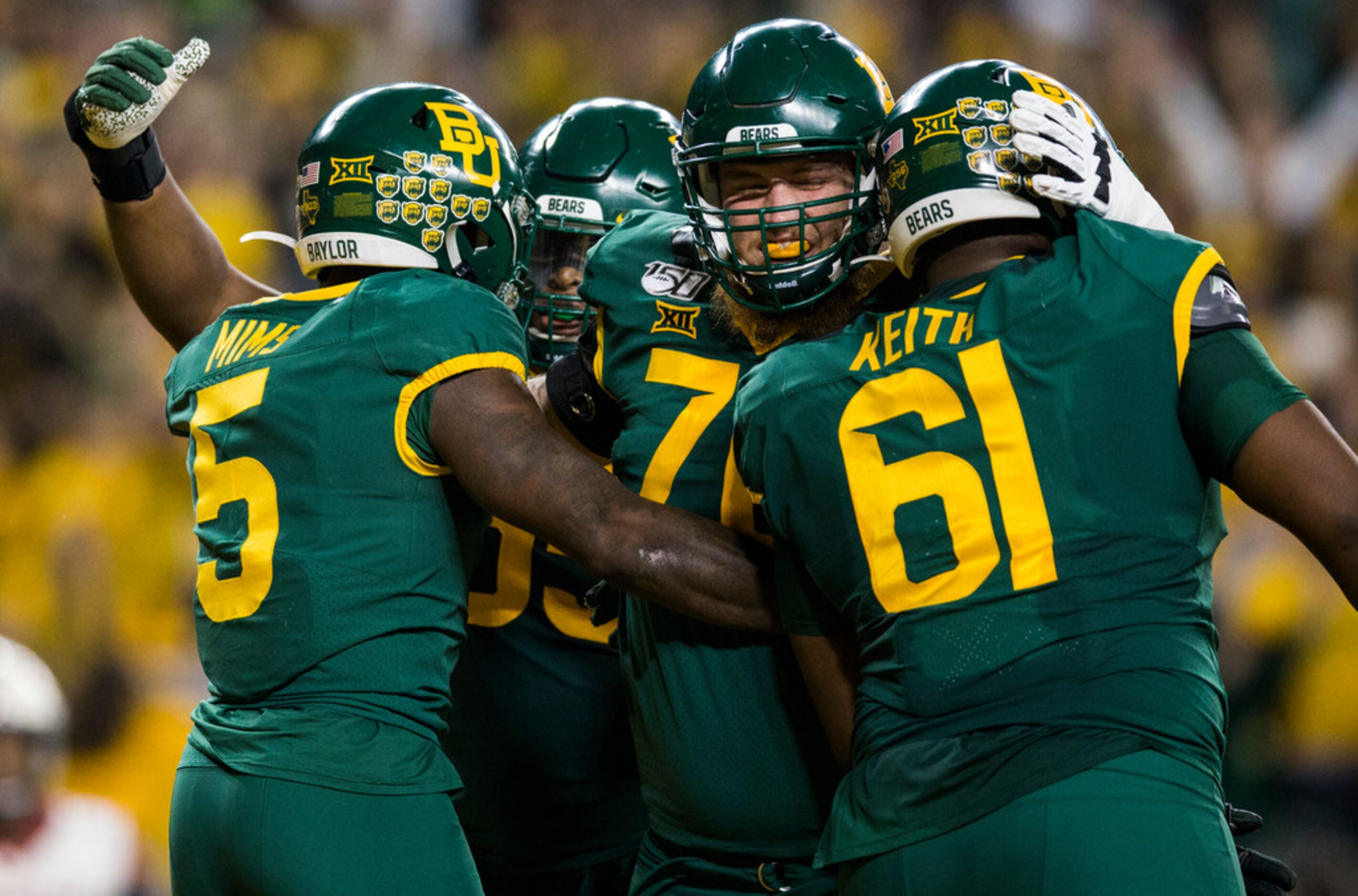 Baylor Bears wide receiver Denzel Mims (5) celebrates a touchdown with his team during the...