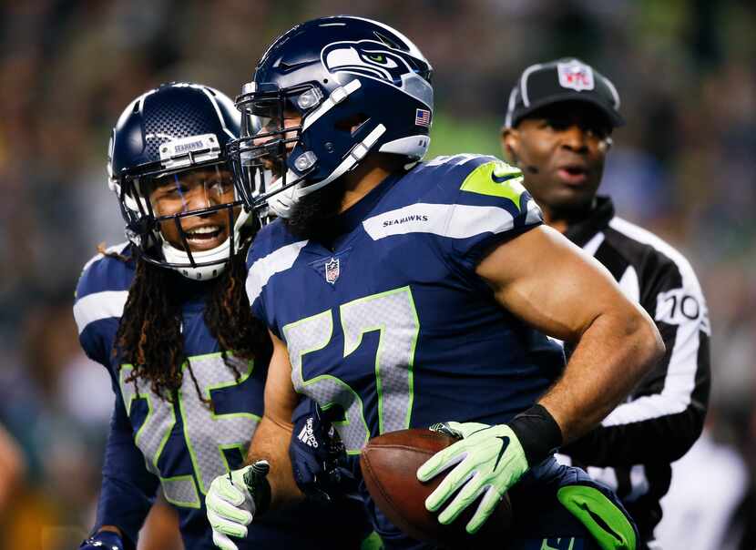 SEATTLE, WA - DECEMBER 03: Linebacker Michael Wilhoite #57 of the Seattle Seahawks...